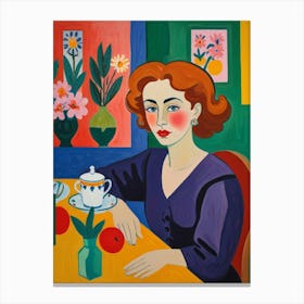 Woman At The Table Canvas Print