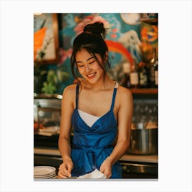 Asian Girl In Blue Apron Canvas Print