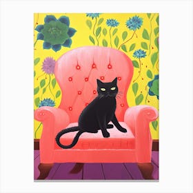 Cute Black Cat Sitting In Pink Armchair Canvas Print