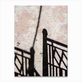 Shadow Of A Fence On A Wall Canvas Print