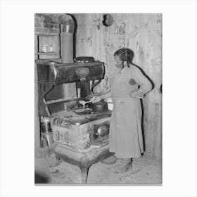Southeast Missouri Farms, Woman Preparing Gravy In Corner Of Kitchen Sharecropper Cabin By Russell Lee Canvas Print