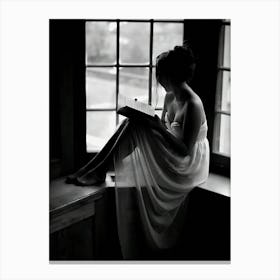 Woman Reading Book In Window Canvas Print