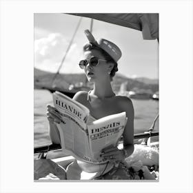 Woman Reading Newspaper On A Boat Canvas Print