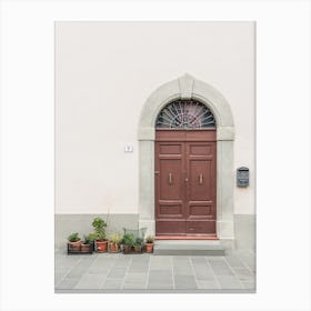 Wooden Red Door And Plants In Tuscany In Italy Canvas Print