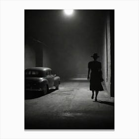 Woman Walking In The Dark Canvas Print