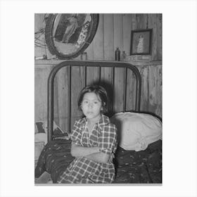 Mexican Girl Sitting On Bed, Crystal City, Texas By Russell Lee Canvas Print