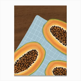 Papaya On A Cutting Board Canvas Print