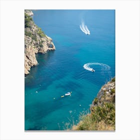 Cliffs and boats in a Mediterranean bay Canvas Print