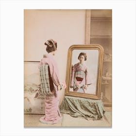Young Japanese Woman Looking In The Mirror Canvas Print