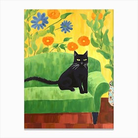 Black Cat Sitting In An Green Armchair Canvas Print
