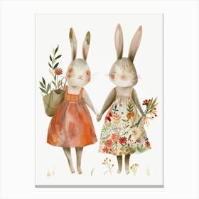 Two Bunnies Holding Flowers Canvas Print