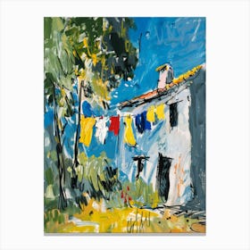 House With Clothes On The Line Canvas Print