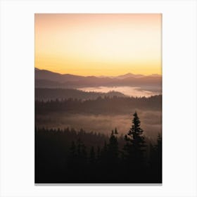 Serene Mountain Silhouette Dominating The Skyline Against The Twilight Hues Of The Vast Wilderness L Canvas Print