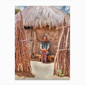 San Bushmen Man In Front Of Hut Canvas Print