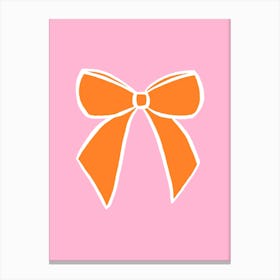 Orange Bow On A Pink Background Canvas Print