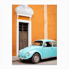 Blue Beetle And Orange Wall In Valladolid Mexico Canvas Print