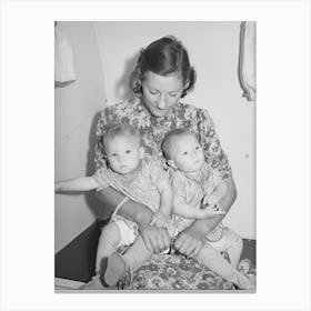 Mother And Her Twin Babies In The Trailer Clinic At The Fsa (Farm Security Administration) Migratory Labor Camp Canvas Print