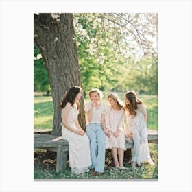 A Jovial Cluster Of Energetic Comrades Nestled Comfortably Outdoors Nestling Closely On A Weathered Canvas Print