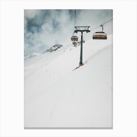 Riding The Lift In Winter Canvas Print