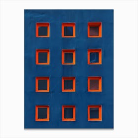 Windows On A Blue Building Canvas Print