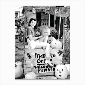 Pin Up Girl Pretending To Sell Carved Pumpkins Canvas Print