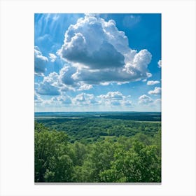 Cumulus Clouds Dominating A Spring Landscape Sunlight Peeks Through The Overcast Sky Casting A Mos Canvas Print