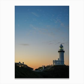 Lighthouse At Dusk, Deep Shadows, Vibrant Orange And Blue Skies. Perfect For Phone Wallpaper And Portrait Prints Canvas Print