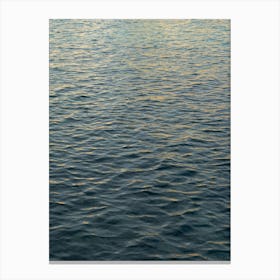 Light reflections in blue-grey sea water Canvas Print