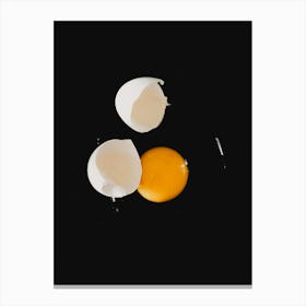 Fried Eggs On A Black Background Canvas Print