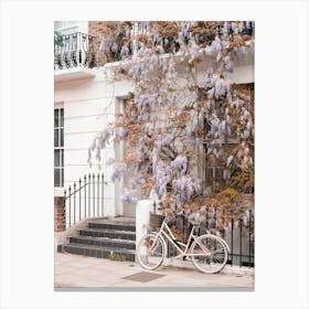 London, England I Primrose Romantic street photography with vintage bike and wisteria flowers like Bridgerton to elegant white Victorian architecture of a boho bohemian London street city urban landscape Canvas Print