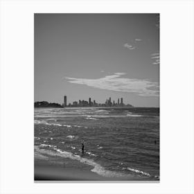 Black And White Beachscape With Gold Coast City Skyline In The Background. Swimmers In The Water On The Beach Canvas Print