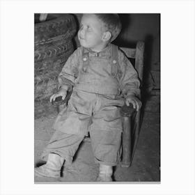 Untitled Photo, Possibly Related To Child Of Migrant Auto Wrecker Sitting Next To Tires In Corner Of Tent Home Canvas Print