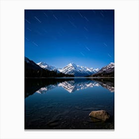 Starry Sky Mirrored On Tranquil Lake Surface Foreground Focus Snow Capped Mountains Rising Majesti Canvas Print