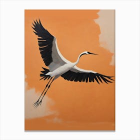 Bird flying orange background Canvas Print