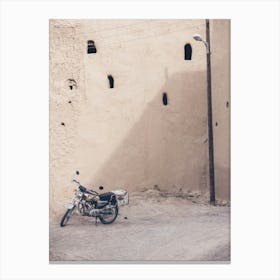 Motorcycle In A Desert Village Canvas Print