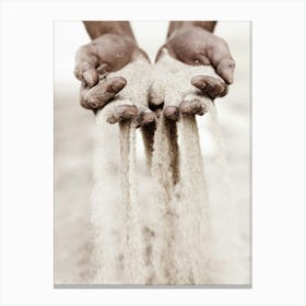 Hands Pouring Sand Canvas Print