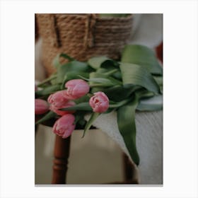 Pink Tulips On A Wooden Chair Canvas Print