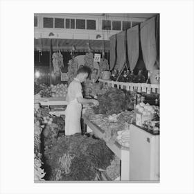 Arranging Vegetables At Retail Grocery, San Angelo, Texas By Russell Lee Canvas Print