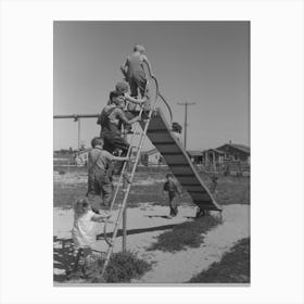 Children Playing On Slide At Fsa (Farm Security Administration) Labor Camp, Caldwell, Idaho By Russell Lee Canvas Print