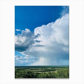 Cumulus Clouds Dominating A Spring Landscape Sunlight Peeks Through The Overcast Sky Casting A Mos (2) Canvas Print