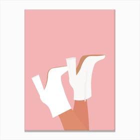 White Fashion Boots on Pink Background Canvas Print