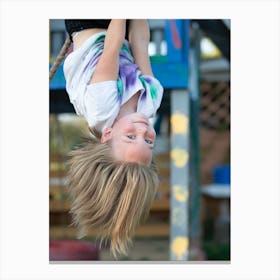 Little Girl Hanging Upside Down Canvas Print