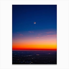 A Sweeping Panorama Of An Evening Sky Blood Red With The Setting Sun Transitions Into A Serene Moon (1) Canvas Print