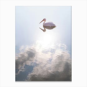 A Pelican And A Cloud In Glossy Blue Water Canvas Print