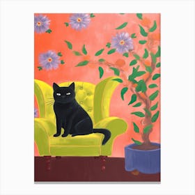 Black Cat Sitting In A Small Yellow Sofa Canvas Print