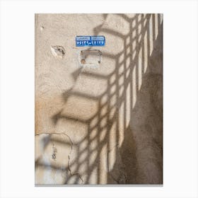 Shadow And A Street Sign Canvas Print