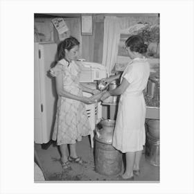 Mrs, Browning And Her Daughter Fill Ice Trays For Electrical Refrigeration, They Are Fsa (Farm Security Administration) Canvas Print