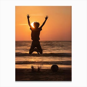 Child Jumping On The Beach At Sunset Canvas Print