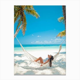 Content Woman Sprawls On A Pristine Tropical Beach Soft White Sands Adorned With Delicate Seashells (2) Canvas Print