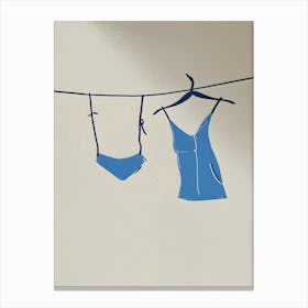 Blue Clothes Hanging On A Clothesline Canvas Print